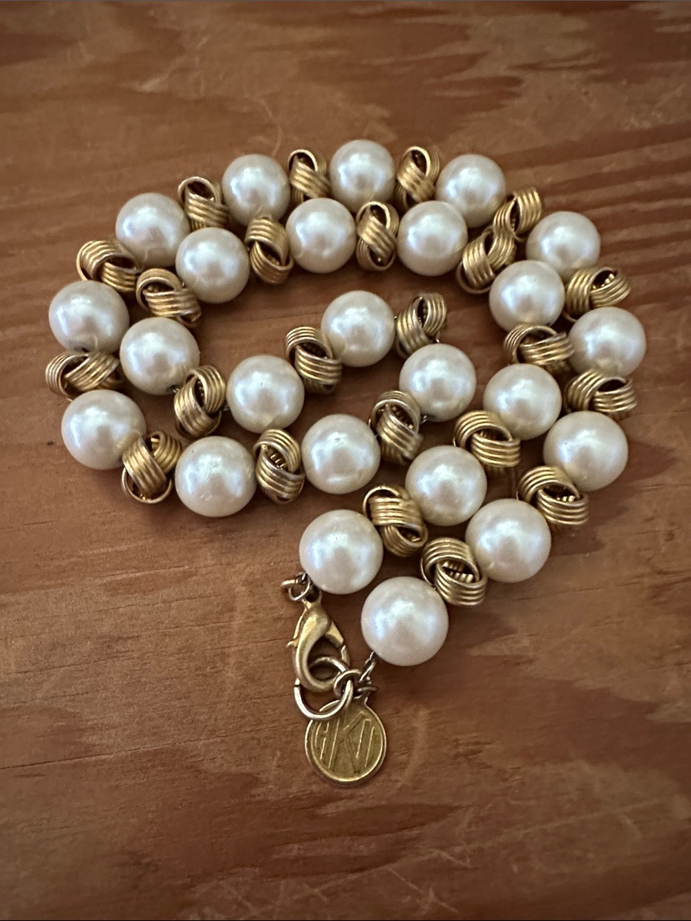 Vintage Anne Klein faux Pearl and gold tone knot necklaceElegant Faux Pearl